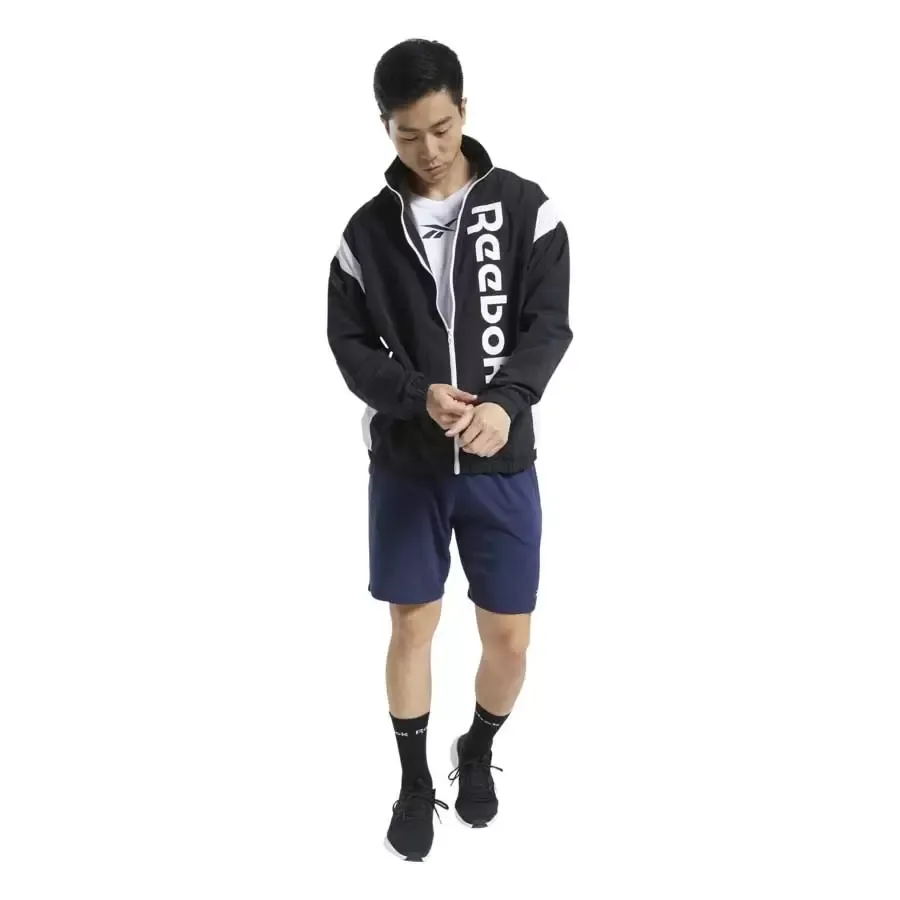 Imagen 2 de 5 de Campera Reebok Te Ll Woven-NEGRO/BLANCO