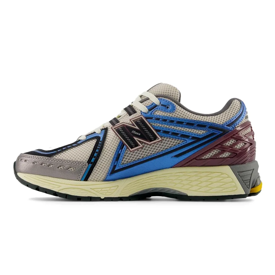 Imagen 2 de 5 de Zapatillas New Balance 1906R-AZUL/NEGRO/BLANCO