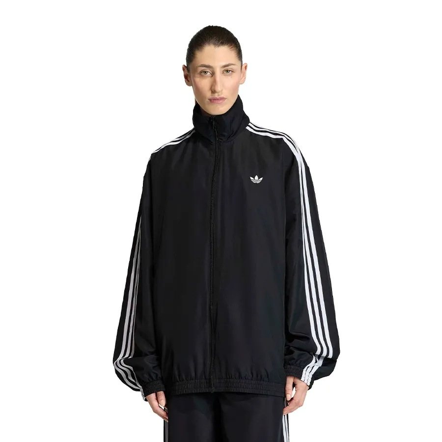Imagen 1 de 6 de Campera adidas originals Firebird Adilenium-NEGRO