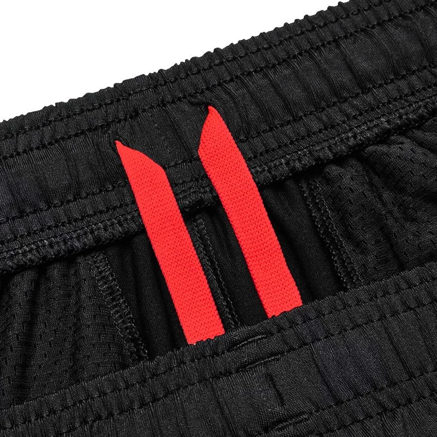 Imagen 2 de 4 de Pantalón Under Armour Challenger-NEGRO/NARANJA FLUOR/BLANCO