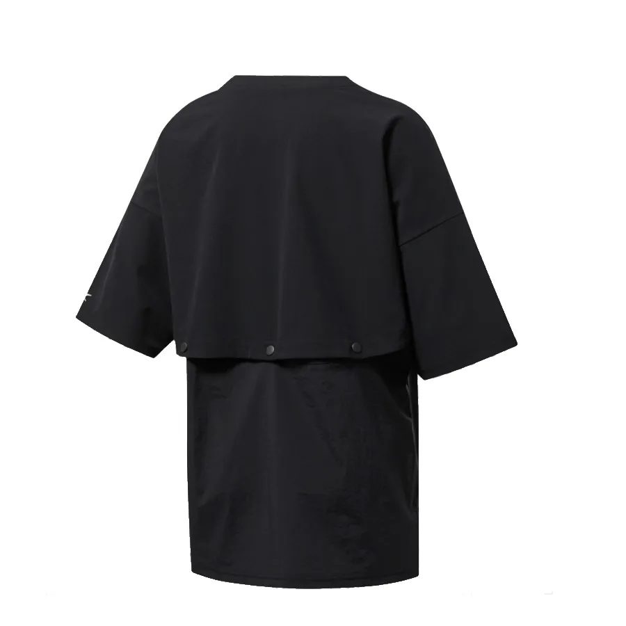 Imagen 4 de 7 de Remera Reebok Dos en uno-NEGRO