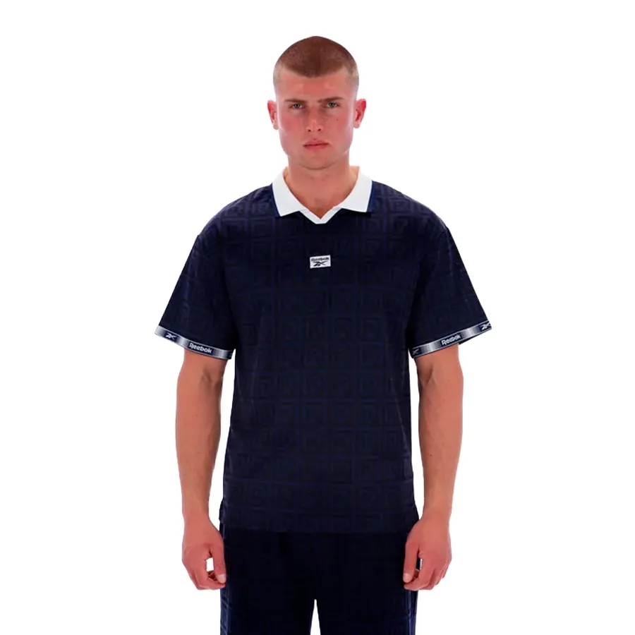 Imagen 0 de 3 de Remera Reebok Polo  Monogram Football-MARINO/NEGRO