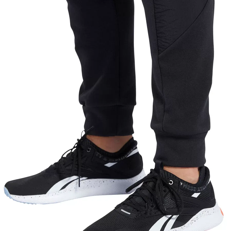 Imagen 2 de 3 de Pantalón Reebok Ts Knit Woven Jogge-NEGRO