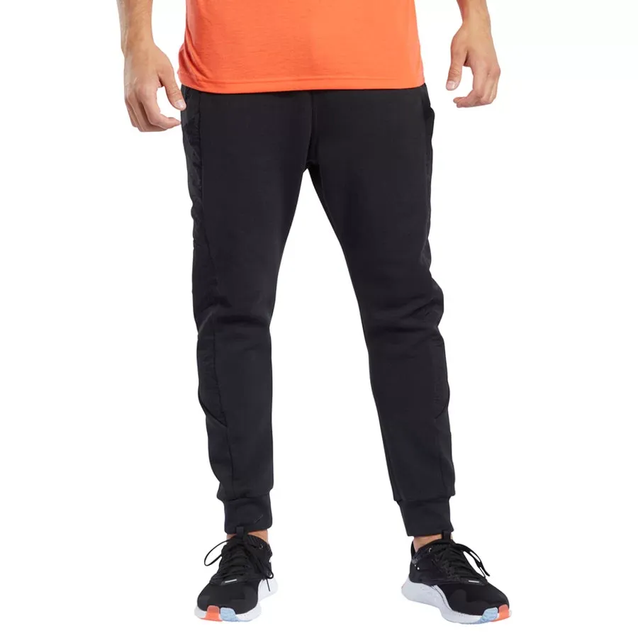 Imagen 0 de 3 de Pantalón Reebok Ts Knit Woven Jogge-NEGRO