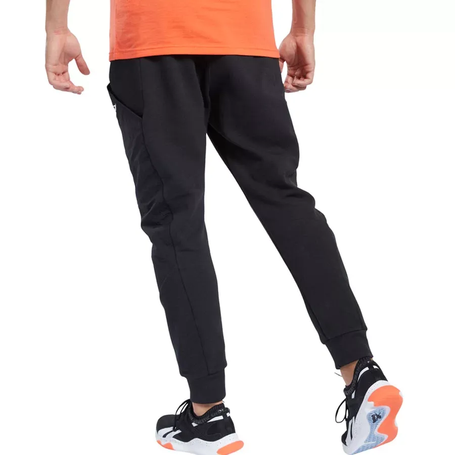 Imagen 1 de 3 de Pantalón Reebok Ts Knit Woven Jogge-NEGRO