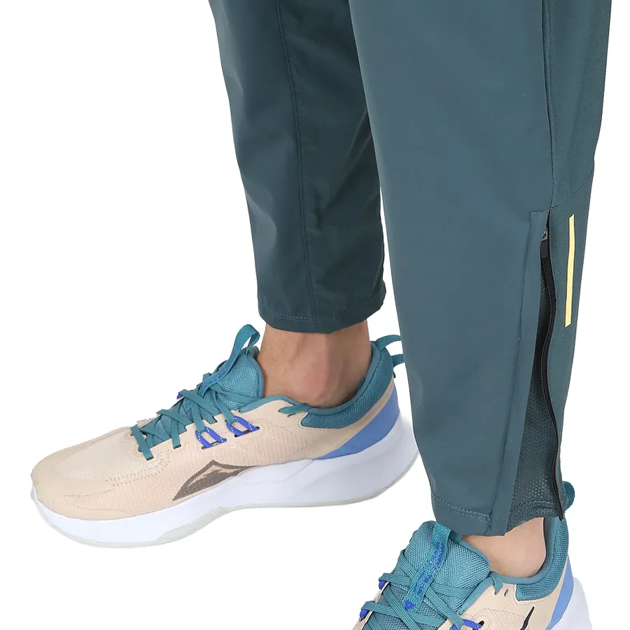 Imagen 4 de 6 de Pantalón Nike Running  Dri-fit Phenom Elite Hombre-VERDE OLIVA/AMARILLO