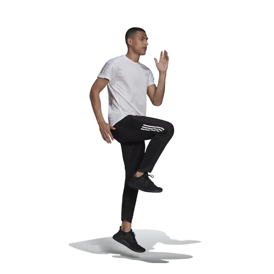 Imagen 4 de 7 de Pantalón adidas Own the Run Astro Wind-NEGRO