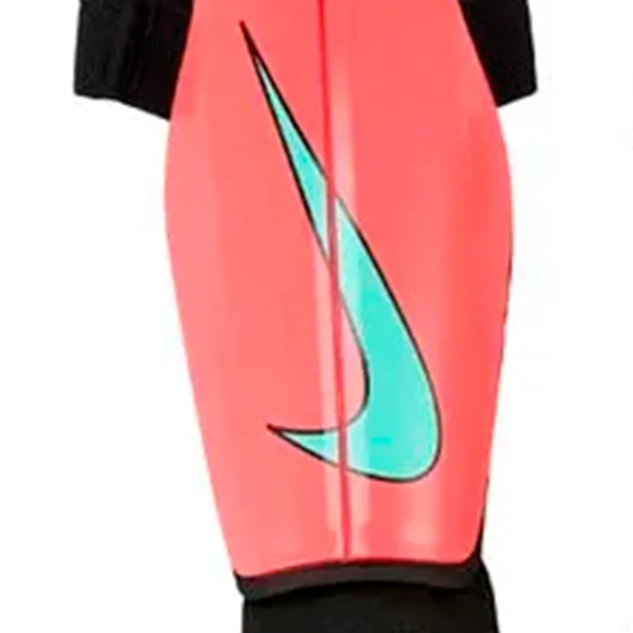 Imagen 1 de 2 de Canilleras Nike Charge-DURAZNO/TURQUESA