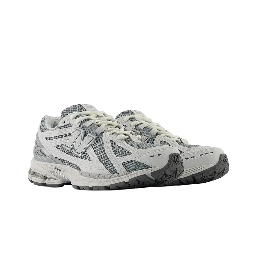 Imagen 1 de 6 de Zapatillas New Balance 1906-GRIS/BLANCO