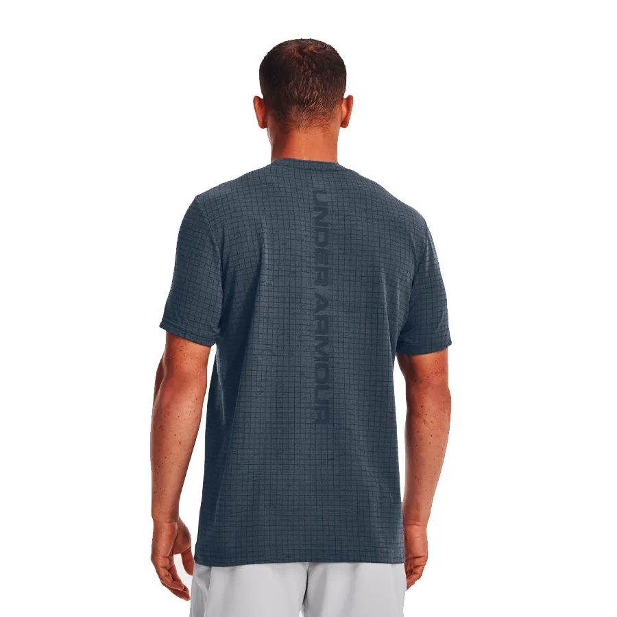 Imagen 3 de 6 de Remera Under Armour Seamless Grid-MARINO