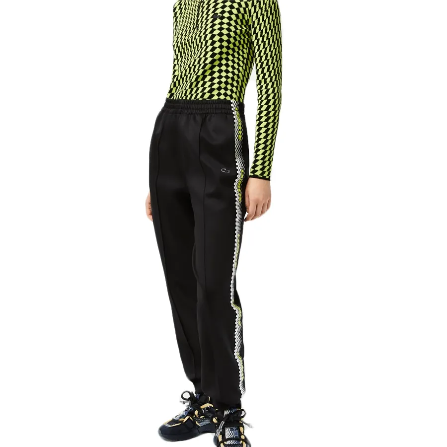 Imagen 1 de 6 de Pantalón Lacoste Survetements-NEGRO/AMARILLO