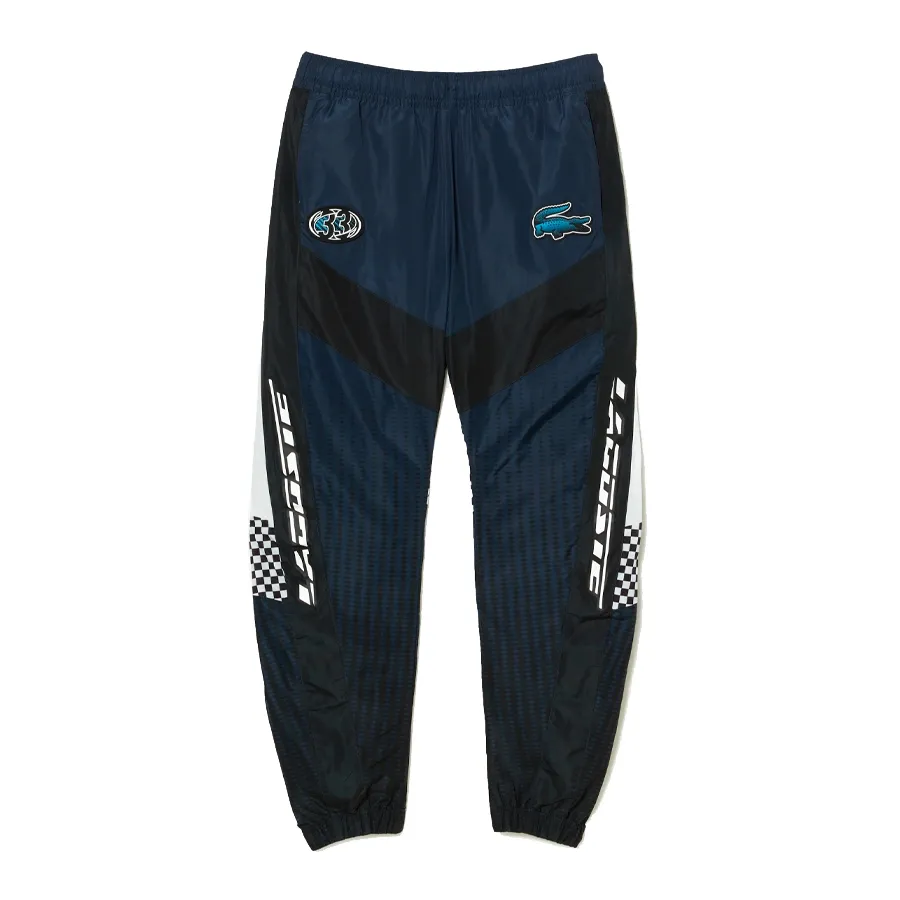 Imagen 0 de 8 de Pantalón Lacoste Survetement-MARINO/NEGRO