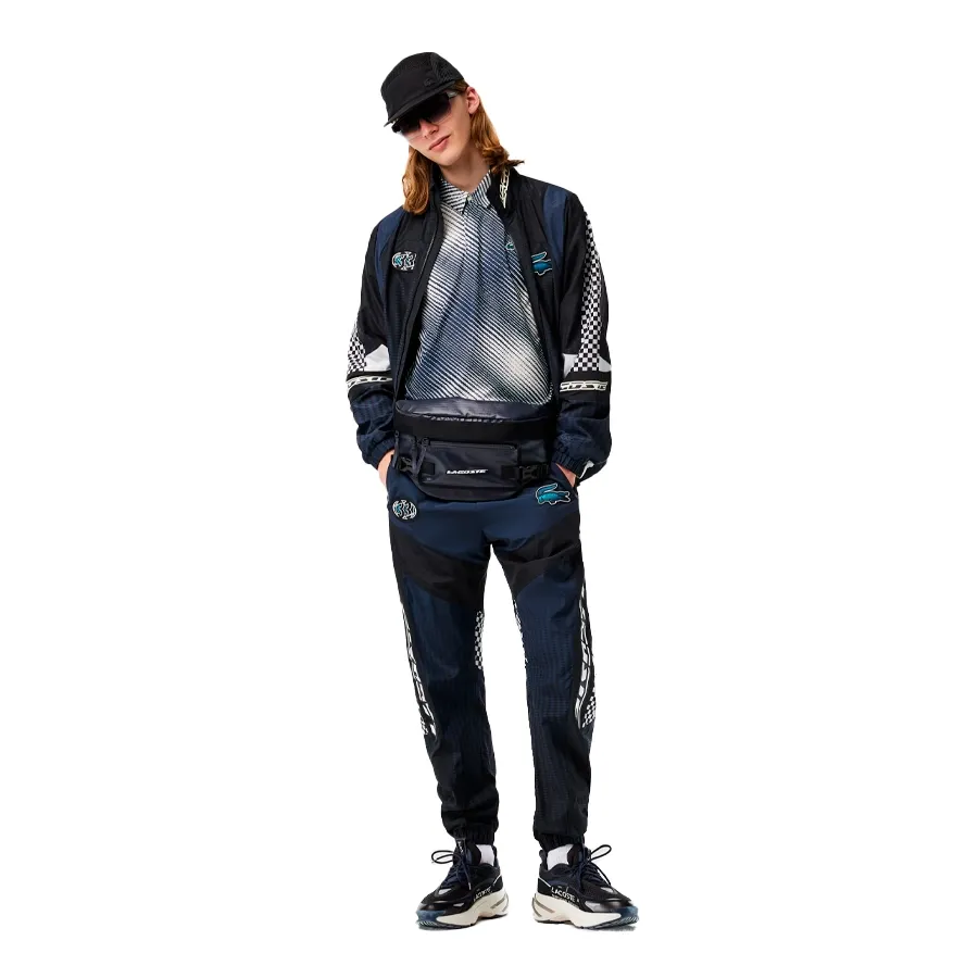 Imagen 3 de 8 de Pantalón Lacoste Survetement-MARINO/NEGRO