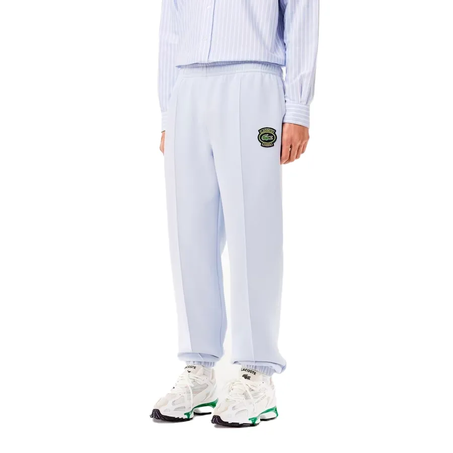Imagen 1 de 4 de Pantalón Lacoste Survetement-CELESTE/VERDE