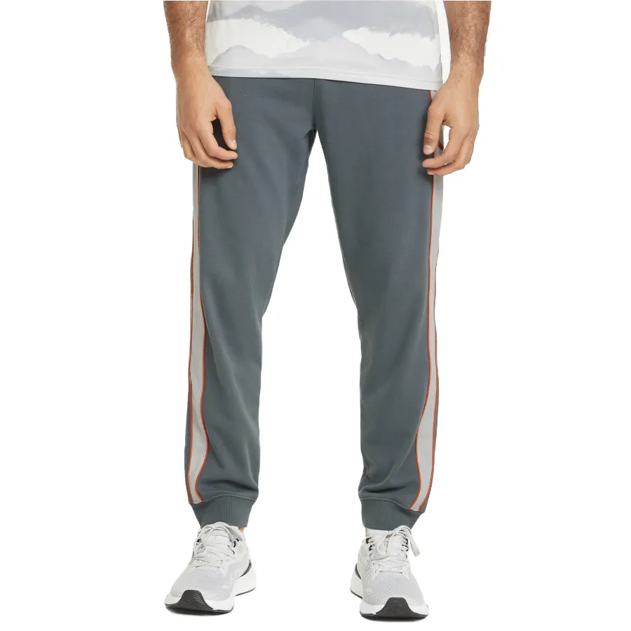 Imagen 0 de 5 de Pantalón Puma Train Knit Jogger-GRAFITO/NARANJA