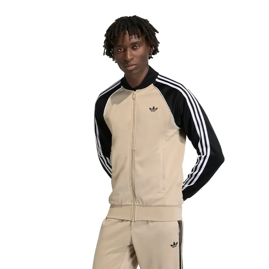 Imagen 0 de 5 de Campera adidas originals Sst-BEIGE/NEGRO