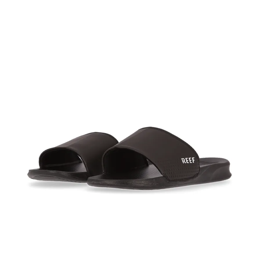 Imagen 2 de 5 de Ojotas Reef Leather Slide Ul-NEGRO
