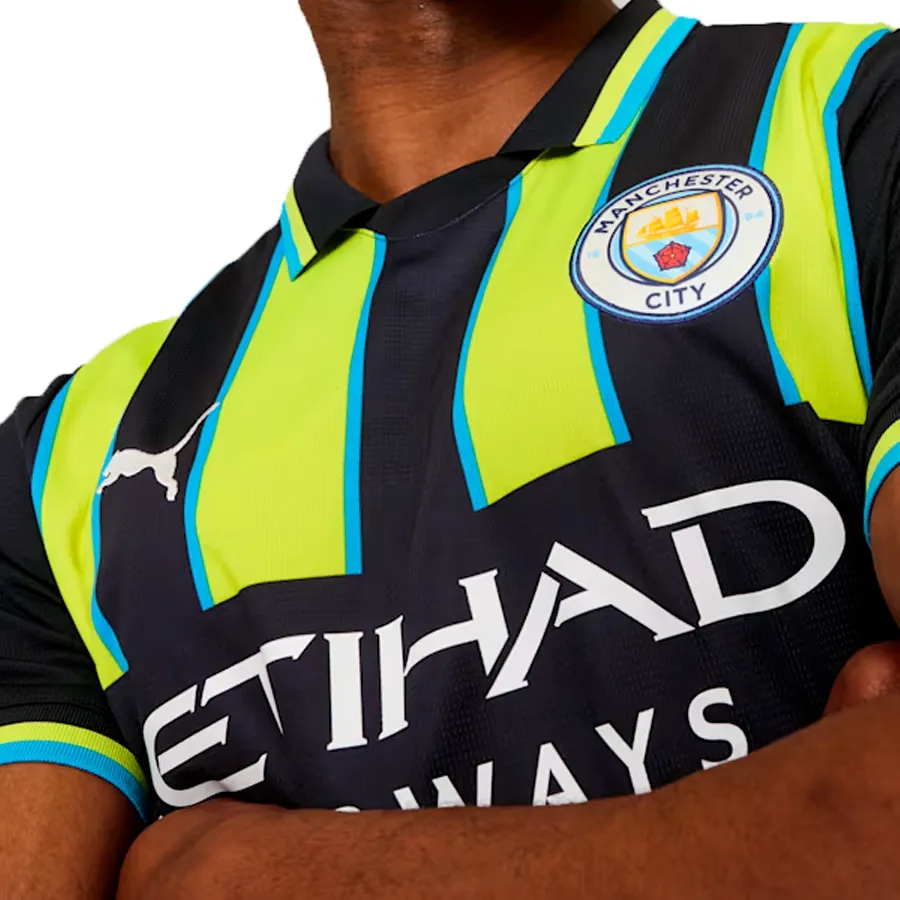 Imagen 1 de 5 de Camiseta Puma Manchester City-NEGRO/VERDE FLUOR