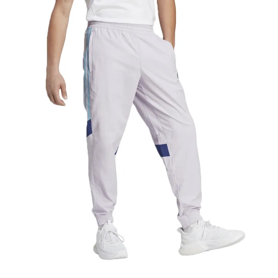 Imagen 2 de 6 de Pantalón adidas Tiro Wov-LILA/CELESTE