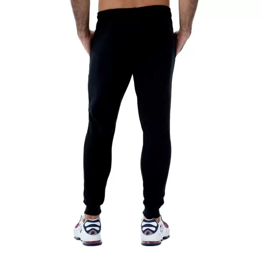 Imagen 0 de 2 de Pantalón Fila Frs Men Basicos Chupin-NEGRO