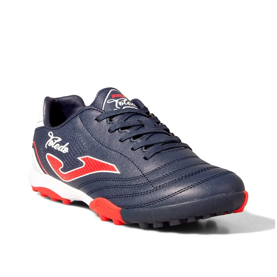 Imagen 1 de 4 de Botines Joma Toledo Turf Jr V4-MARINO/ROJO/BLANCO