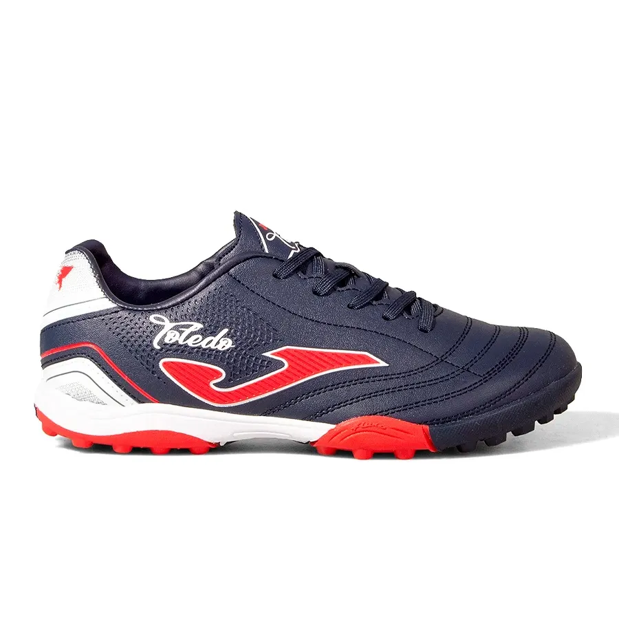 Imagen 0 de 4 de Botines Joma Toledo Turf Jr V4-MARINO/ROJO/BLANCO