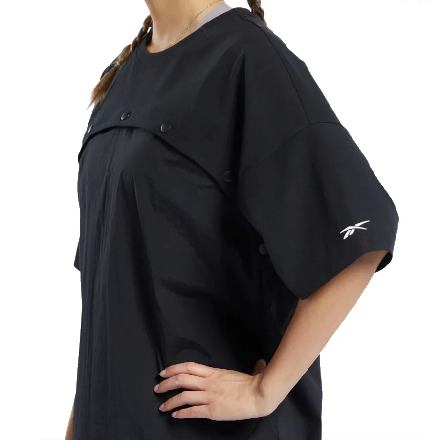 Imagen 5 de 7 de Remera Reebok Dos en uno-NEGRO