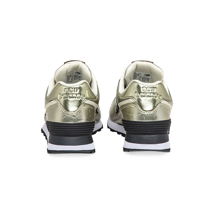 Imagen 3 de 5 de Zapatillas New Balance 574-DORADO/NEGRO