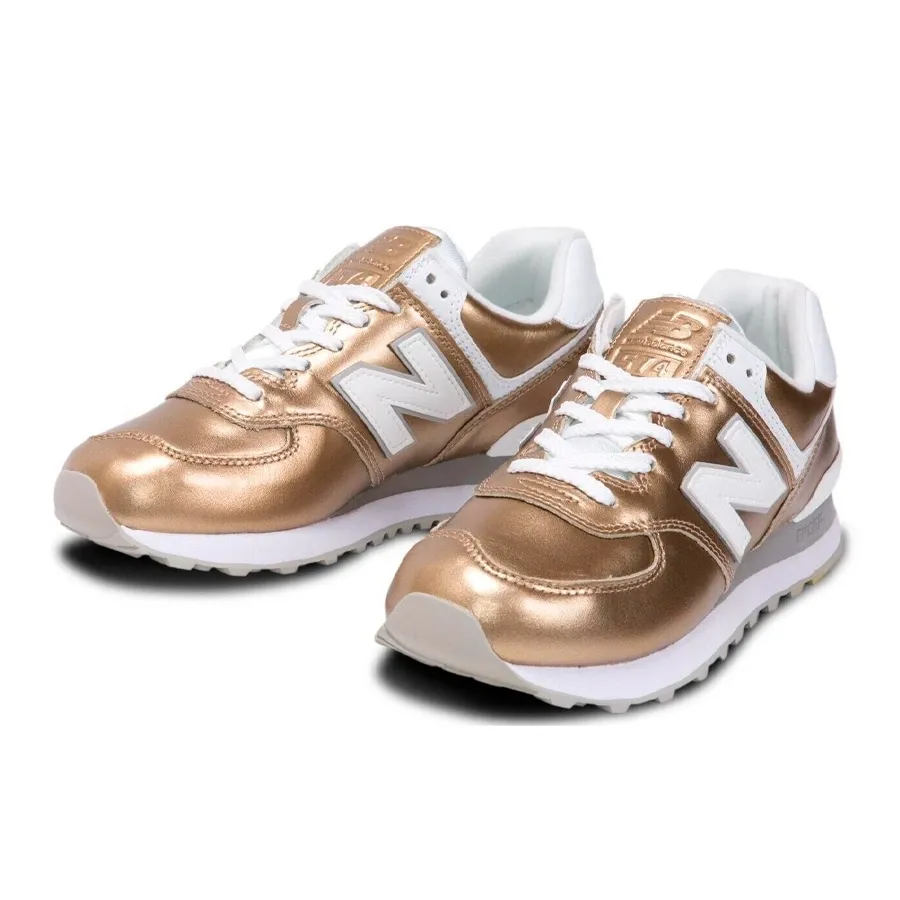 Imagen 1 de 5 de Zapatillas New Balance 574-DORADO/BLANCO