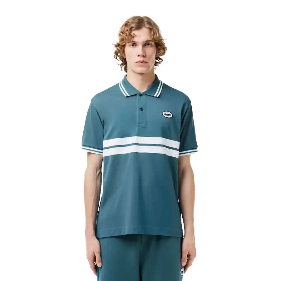 Imagen 0 de 2 de Polo Lacoste-PETROLEO/BLANCO