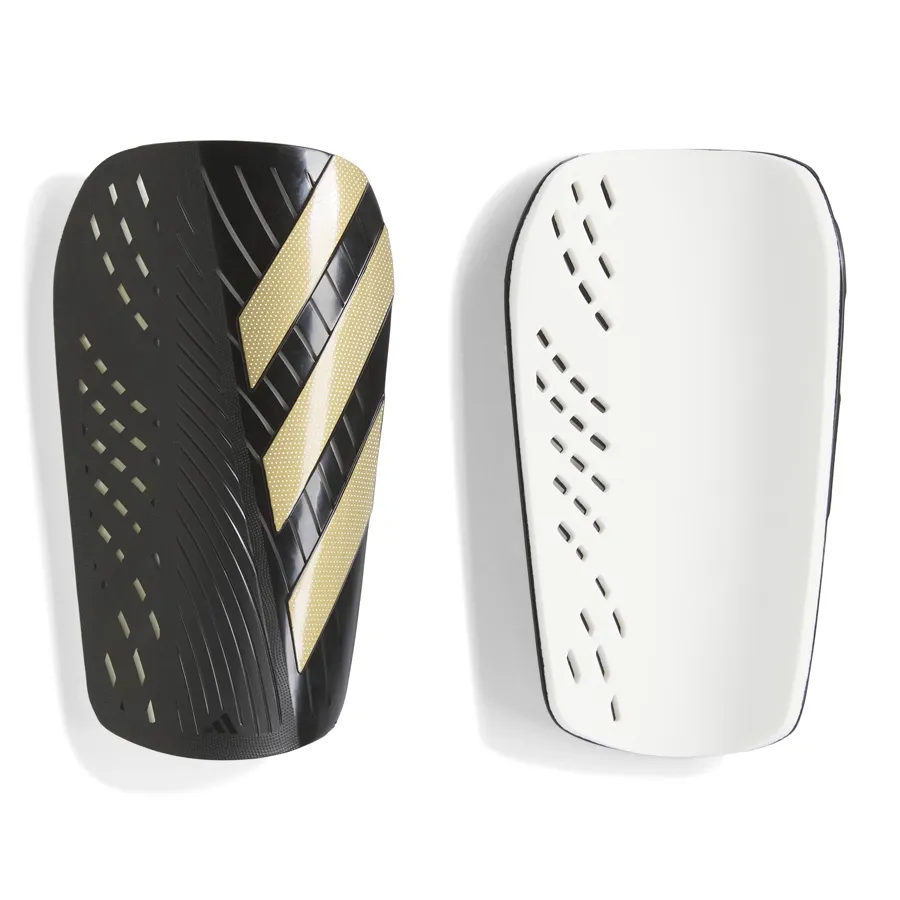 Imagen 0 de 3 de Canilleras adidas Tiro Sg Clb-NEGRO/DORADO