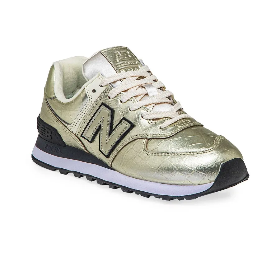 Imagen 1 de 5 de Zapatillas New Balance 574-DORADO/NEGRO