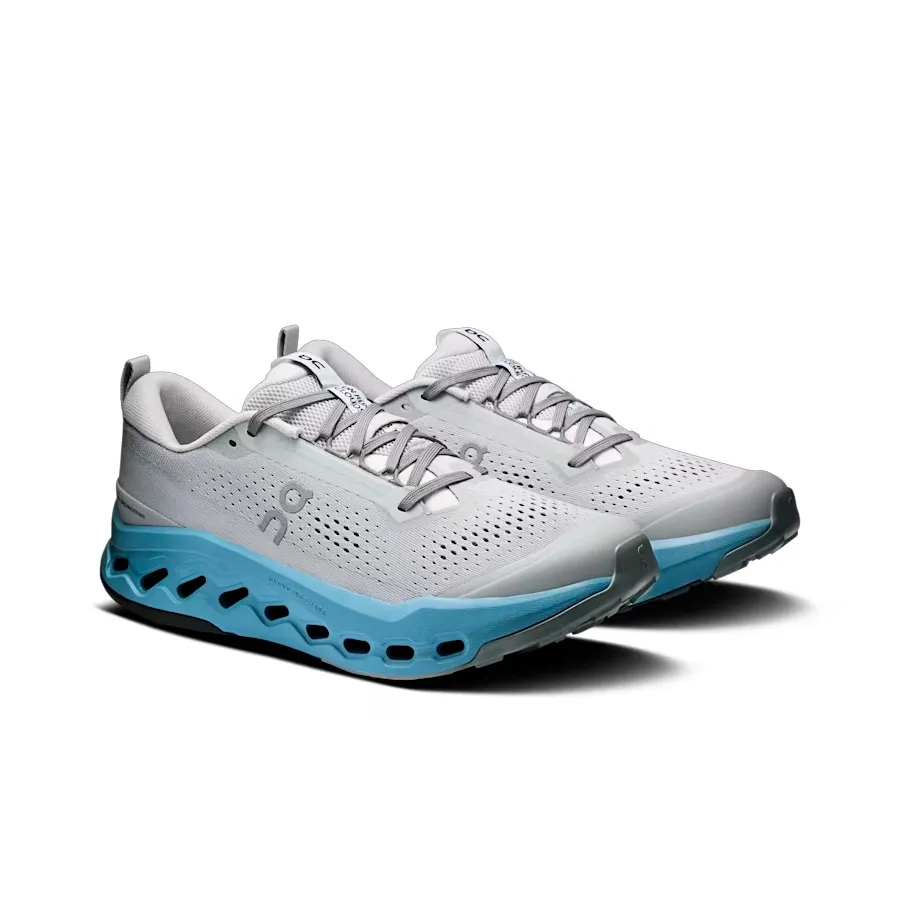 Imagen 1 de 6 de Zapatillas On Cloudsurfer Trail 2-GRIS/CELESTE