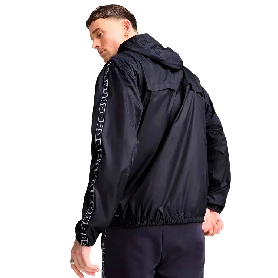 Imagen 2 de 5 de Campera Puma rompevientos Essentials Tape-MARINO