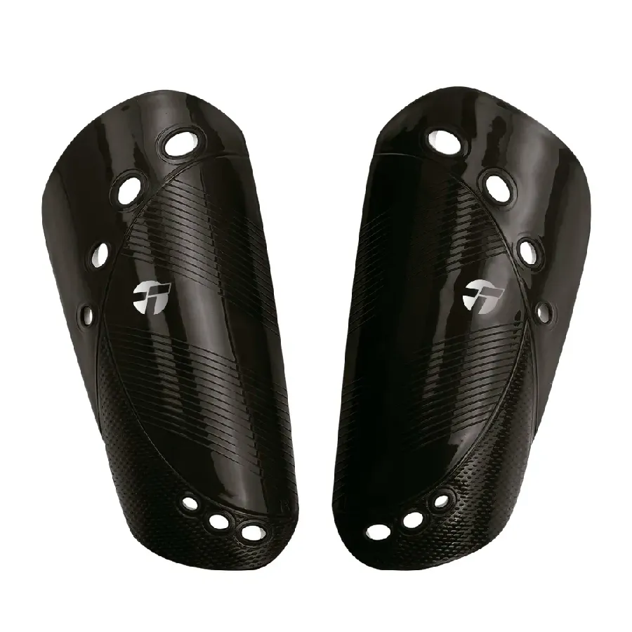 Imagen 0 de 1 de Canilleras Topper Canillera Kick-NEGRO